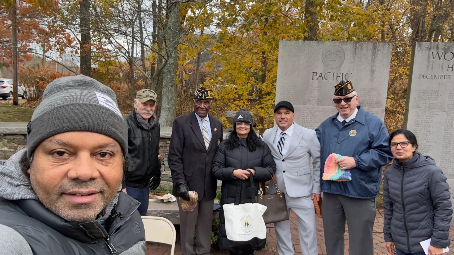 Outdoor gathering at a monument