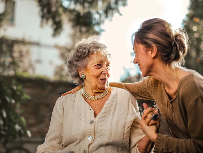 Grandmother and granddaughter sharing a moment