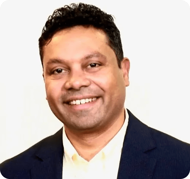 Smiling person in a suit