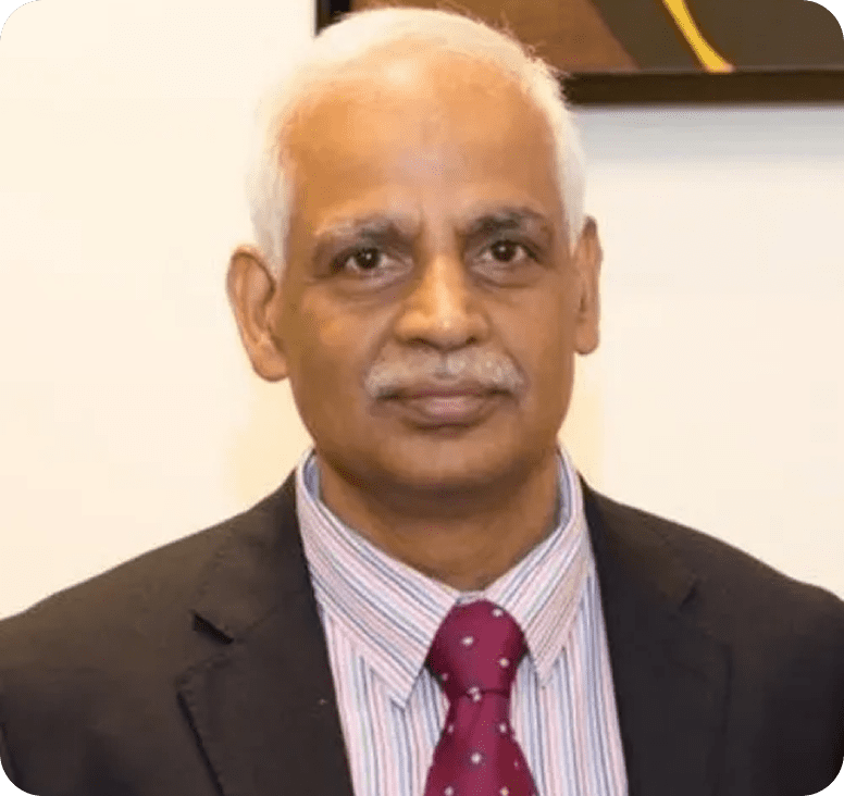 Mature man with white hair, formal attire
